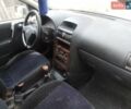 Серый Опель Астра, объемом двигателя 2 л и пробегом 350 тыс. км за 800 $, фото 4 на Automoto.ua