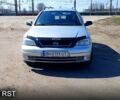 Серый Опель Астра, объемом двигателя 2 л и пробегом 300 тыс. км за 3300 $, фото 1 на Automoto.ua