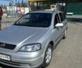 Серый Опель Астра, объемом двигателя 2 л и пробегом 392 тыс. км за 3125 $, фото 1 на Automoto.ua