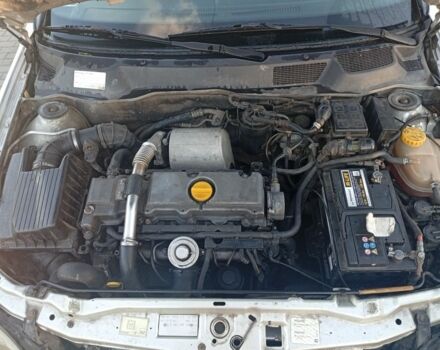 Серый Опель Астра, объемом двигателя 2 л и пробегом 320 тыс. км за 1350 $, фото 2 на Automoto.ua