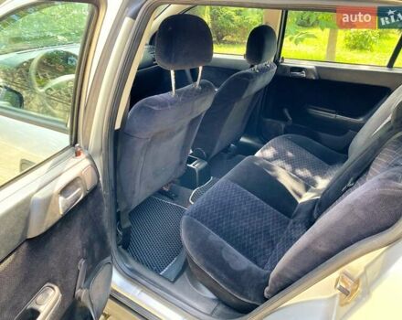 Серый Опель Астра, объемом двигателя 2 л и пробегом 285 тыс. км за 2900 $, фото 9 на Automoto.ua