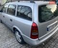 Серый Опель Астра, объемом двигателя 2 л и пробегом 285 тыс. км за 2900 $, фото 2 на Automoto.ua