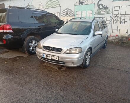 Серый Опель Астра, объемом двигателя 2 л и пробегом 320 тыс. км за 1350 $, фото 1 на Automoto.ua