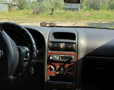 Серый Опель Астра, объемом двигателя 2 л и пробегом 390 тыс. км за 4500 $, фото 21 на Automoto.ua