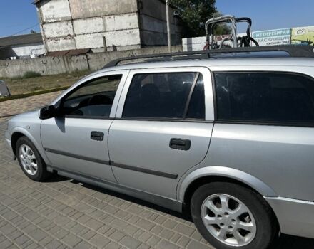 Серый Опель Астра, объемом двигателя 2 л и пробегом 392 тыс. км за 3125 $, фото 2 на Automoto.ua