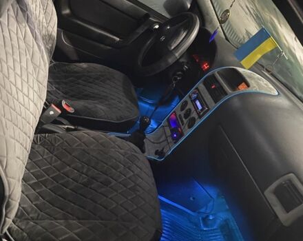 Серый Опель Астра, объемом двигателя 1.4 л и пробегом 400 тыс. км за 2000 $, фото 3 на Automoto.ua