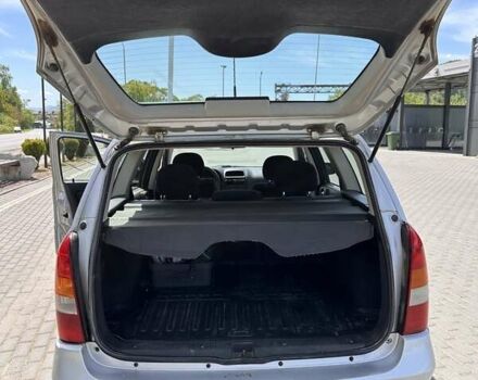 Серый Опель Астра, объемом двигателя 1.6 л и пробегом 323 тыс. км за 1700 $, фото 8 на Automoto.ua