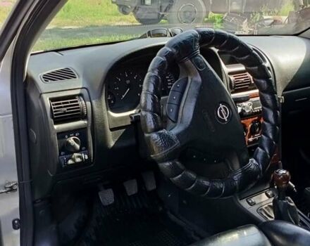 Серый Опель Астра, объемом двигателя 2 л и пробегом 390 тыс. км за 4500 $, фото 10 на Automoto.ua