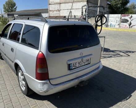 Серый Опель Астра, объемом двигателя 2 л и пробегом 392 тыс. км за 3125 $, фото 4 на Automoto.ua