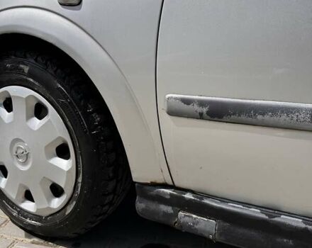 Серый Опель Астра, объемом двигателя 1.6 л и пробегом 323 тыс. км за 1700 $, фото 12 на Automoto.ua