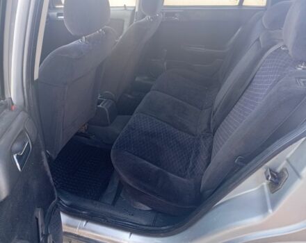 Серый Опель Астра, объемом двигателя 2 л и пробегом 320 тыс. км за 1350 $, фото 5 на Automoto.ua