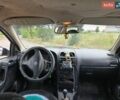 Серый Опель Астра, объемом двигателя 2 л и пробегом 350 тыс. км за 1800 $, фото 2 на Automoto.ua