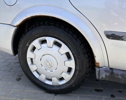 Серый Опель Астра, объемом двигателя 1.6 л и пробегом 323 тыс. км за 1700 $, фото 11 на Automoto.ua