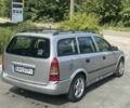Серый Опель Астра, объемом двигателя 1.6 л и пробегом 260 тыс. км за 1007 $, фото 4 на Automoto.ua