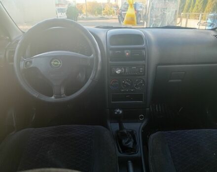 Серый Опель Астра, объемом двигателя 2 л и пробегом 320 тыс. км за 1350 $, фото 3 на Automoto.ua