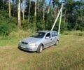 Серый Опель Астра, объемом двигателя 1.8 л и пробегом 310 тыс. км за 950 $, фото 1 на Automoto.ua