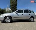 Серый Опель Астра, объемом двигателя 2 л и пробегом 200 тыс. км за 3200 $, фото 9 на Automoto.ua