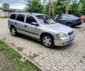 Серый Опель Астра, объемом двигателя 1.6 л и пробегом 252 тыс. км за 1800 $, фото 1 на Automoto.ua