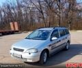 Сірий Опель Астра, об'ємом двигуна 2 л та пробігом 100 тис. км за 2500 $, фото 1 на Automoto.ua