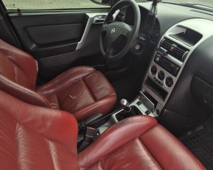 Серый Опель Астра, объемом двигателя 1.4 л и пробегом 349 тыс. км за 3300 $, фото 4 на Automoto.ua