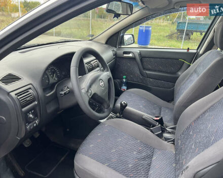 Серый Опель Астра, объемом двигателя 2 л и пробегом 400 тыс. км за 3250 $, фото 13 на Automoto.ua