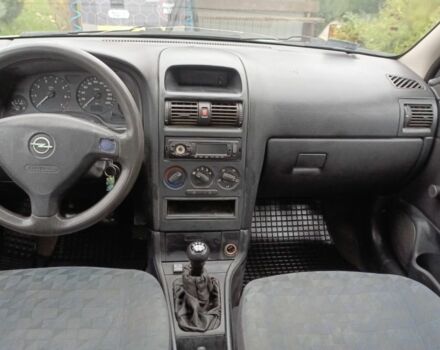 Серый Опель Астра, объемом двигателя 1.4 л и пробегом 250 тыс. км за 2399 $, фото 3 на Automoto.ua