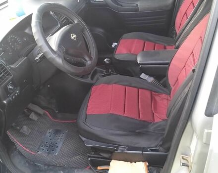 Серый Опель Астра, объемом двигателя 2 л и пробегом 287 тыс. км за 4500 $, фото 4 на Automoto.ua