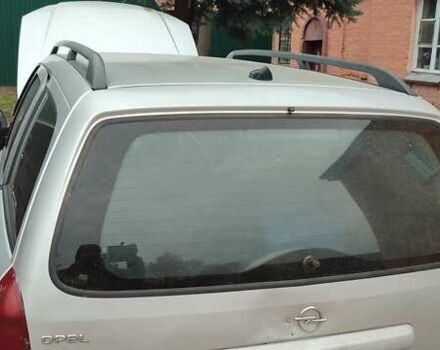 Серый Опель Астра, объемом двигателя 2 л и пробегом 400 тыс. км за 1400 $, фото 3 на Automoto.ua