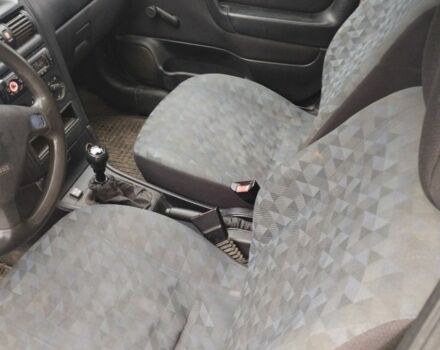 Серый Опель Астра, объемом двигателя 1.4 л и пробегом 250 тыс. км за 2399 $, фото 4 на Automoto.ua