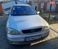 Серый Опель Астра, объемом двигателя 1.6 л и пробегом 216 тыс. км за 3200 $, фото 1 на Automoto.ua