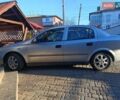 Серый Опель Астра, объемом двигателя 1.6 л и пробегом 216 тыс. км за 3200 $, фото 6 на Automoto.ua