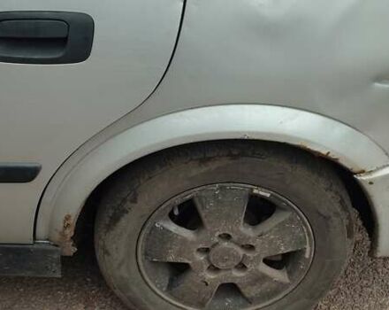 Серый Опель Астра, объемом двигателя 2 л и пробегом 400 тыс. км за 1400 $, фото 4 на Automoto.ua