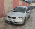 Серый Опель Астра, объемом двигателя 2 л и пробегом 380 тыс. км за 4000 $, фото 1 на Automoto.ua