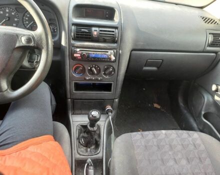 Серый Опель Астра, объемом двигателя 1.8 л и пробегом 329 тыс. км за 3355 $, фото 9 на Automoto.ua