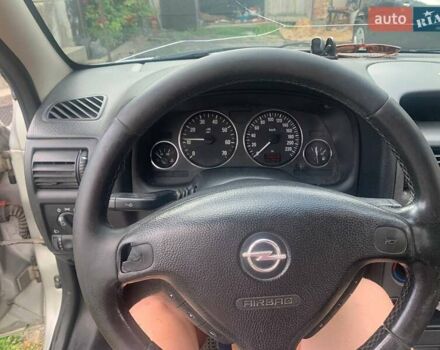 Серый Опель Астра, объемом двигателя 1.6 л и пробегом 242 тыс. км за 3800 $, фото 9 на Automoto.ua