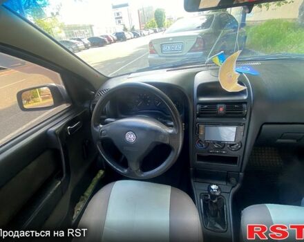 Серый Опель Астра, объемом двигателя 1.6 л и пробегом 400 тыс. км за 3100 $, фото 4 на Automoto.ua