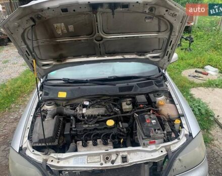 Серый Опель Астра, объемом двигателя 1.6 л и пробегом 242 тыс. км за 3800 $, фото 8 на Automoto.ua
