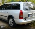 Серый Опель Астра, объемом двигателя 2 л и пробегом 241 тыс. км за 4000 $, фото 2 на Automoto.ua