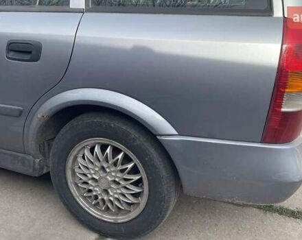 Серый Опель Астра, объемом двигателя 1.6 л и пробегом 190 тыс. км за 3400 $, фото 8 на Automoto.ua