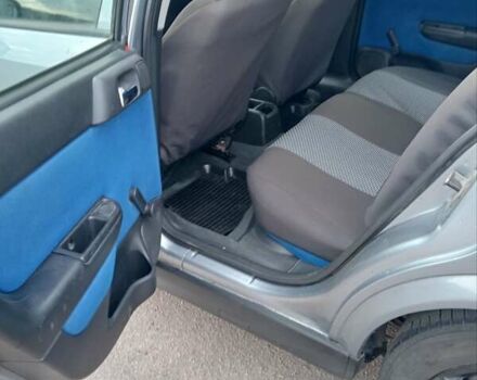 Серый Опель Астра, объемом двигателя 2 л и пробегом 332 тыс. км за 3500 $, фото 3 на Automoto.ua