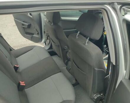 Серый Опель Астра, объемом двигателя 1.6 л и пробегом 281 тыс. км за 4500 $, фото 7 на Automoto.ua