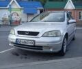 Серый Опель Астра, объемом двигателя 1.6 л и пробегом 195 тыс. км за 3100 $, фото 1 на Automoto.ua