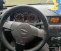 Серый Опель Астра, объемом двигателя 1.6 л и пробегом 242 тыс. км за 5000 $, фото 7 на Automoto.ua