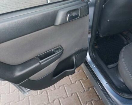 Серый Опель Астра, объемом двигателя 2 л и пробегом 300 тыс. км за 4500 $, фото 8 на Automoto.ua