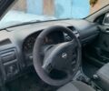 Серый Опель Астра, объемом двигателя 1.2 л и пробегом 250 тыс. км за 1800 $, фото 9 на Automoto.ua
