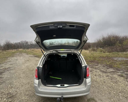 Серый Опель Астра, объемом двигателя 1.6 л и пробегом 242 тыс. км за 4100 $, фото 10 на Automoto.ua