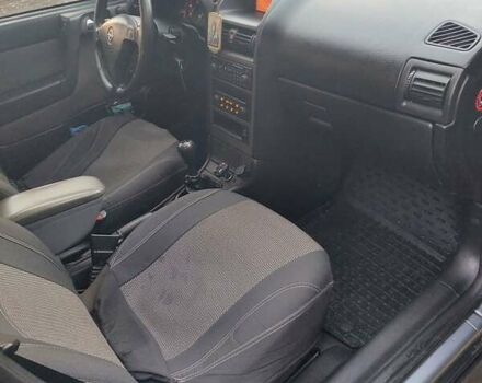 Серый Опель Астра, объемом двигателя 2 л и пробегом 300 тыс. км за 4500 $, фото 11 на Automoto.ua