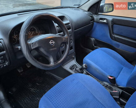 Серый Опель Астра, объемом двигателя 2 л и пробегом 333 тыс. км за 3450 $, фото 7 на Automoto.ua