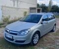 Серый Опель Астра, объемом двигателя 1.6 л и пробегом 210 тыс. км за 3014 $, фото 1 на Automoto.ua