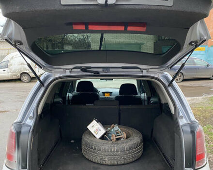 Серый Опель Астра, объемом двигателя 1.4 л и пробегом 410 тыс. км за 3700 $, фото 9 на Automoto.ua